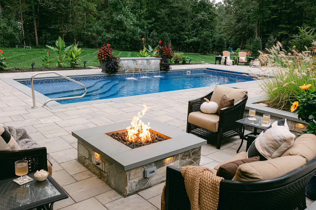 Outdoor firepit by pool