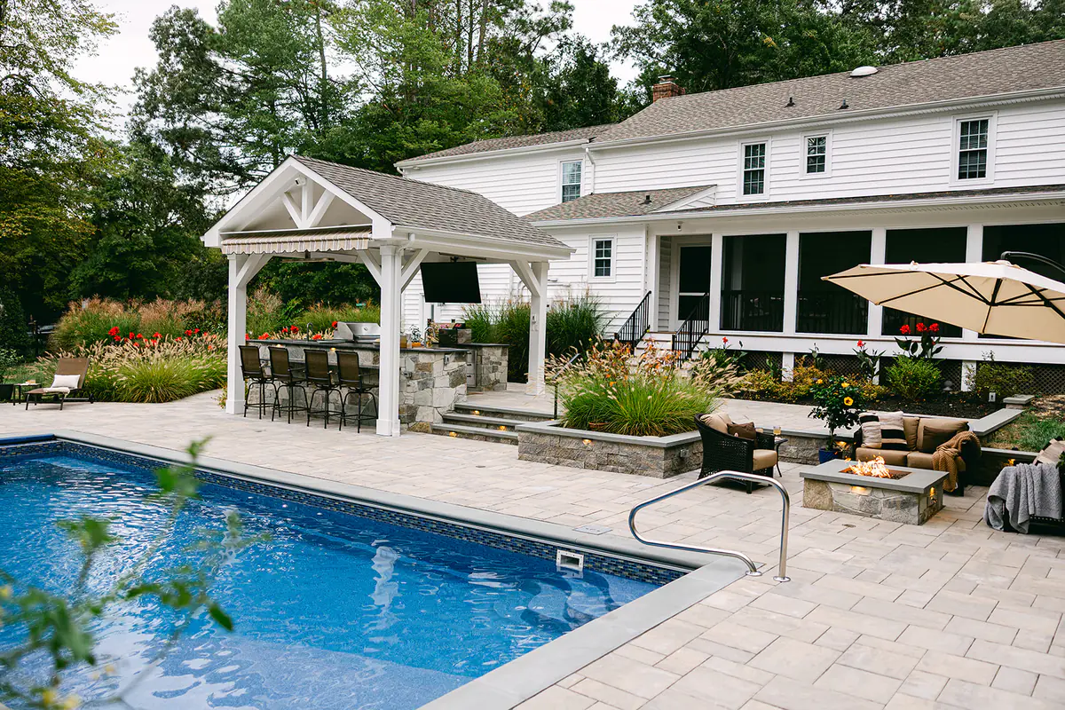 custom built outdoor pool and backyard renovation