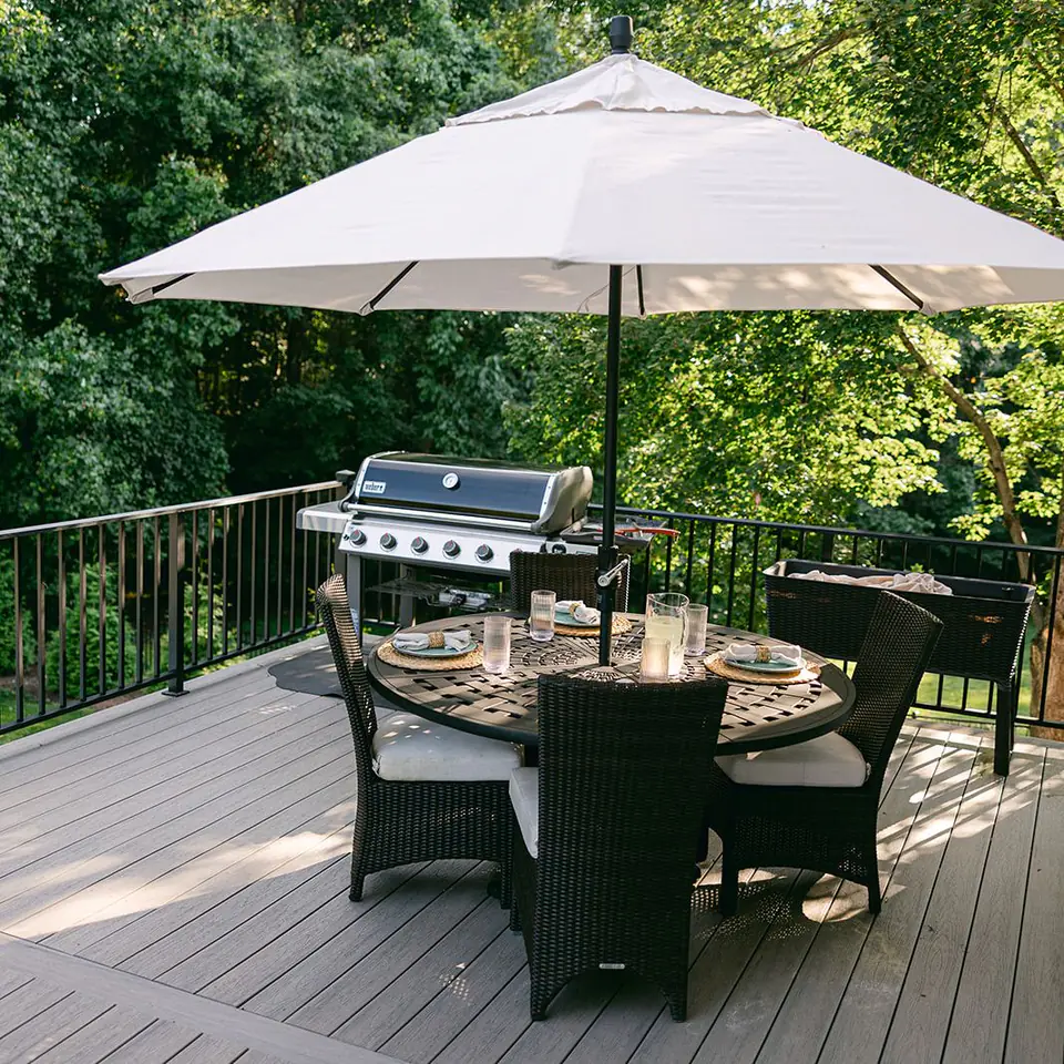 Composite deck with aluminum railing