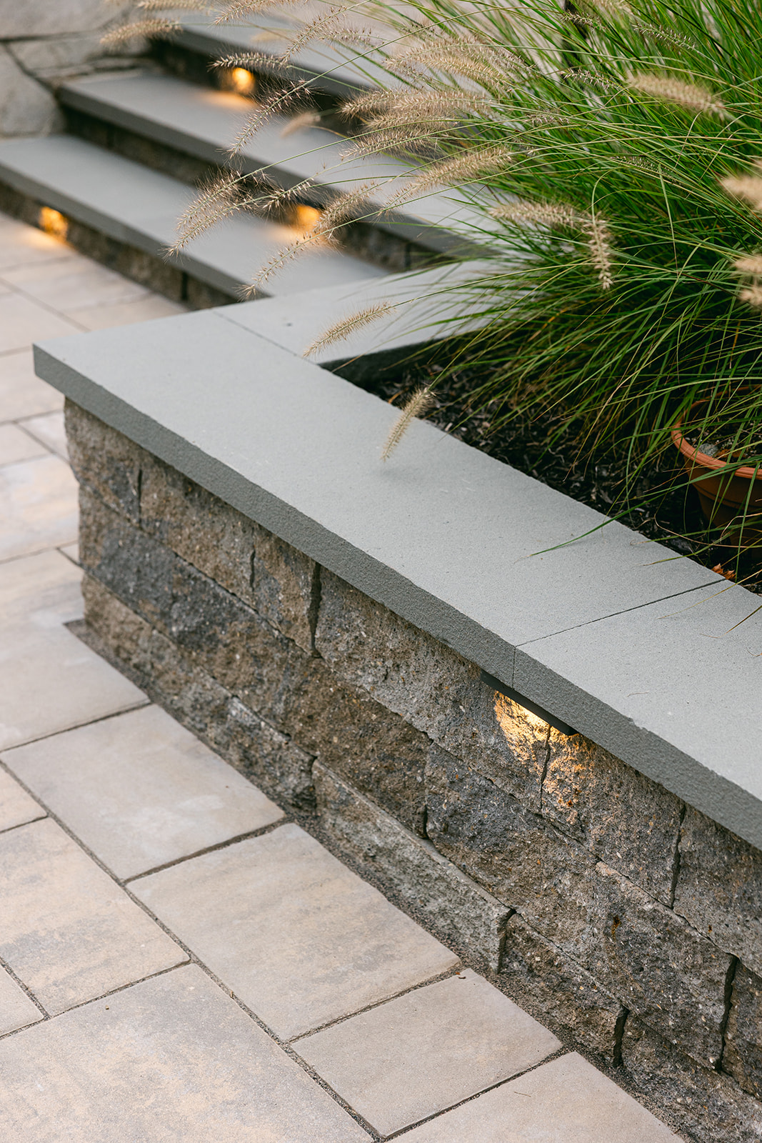 lighting on stone wall