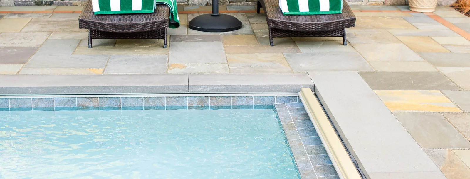 Pool with hot tub and bluestone patio