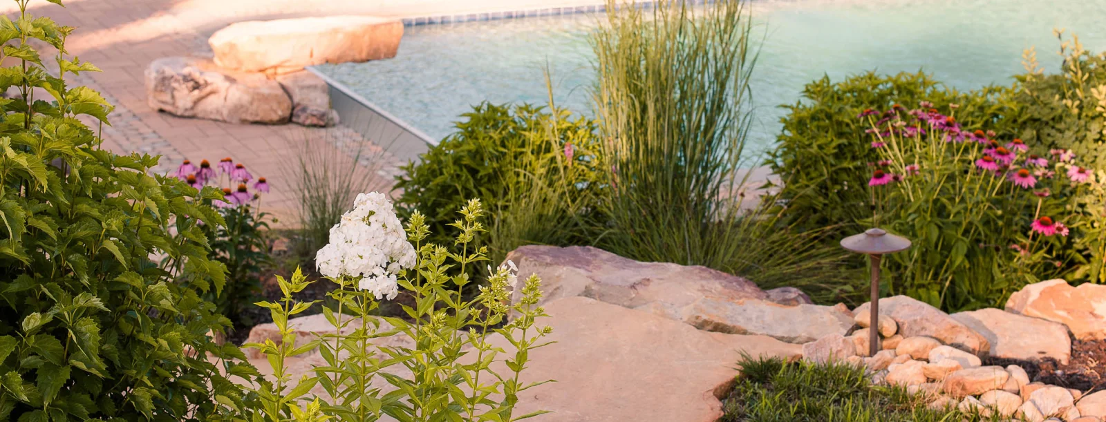 Pool with hot tub and bluestone patio