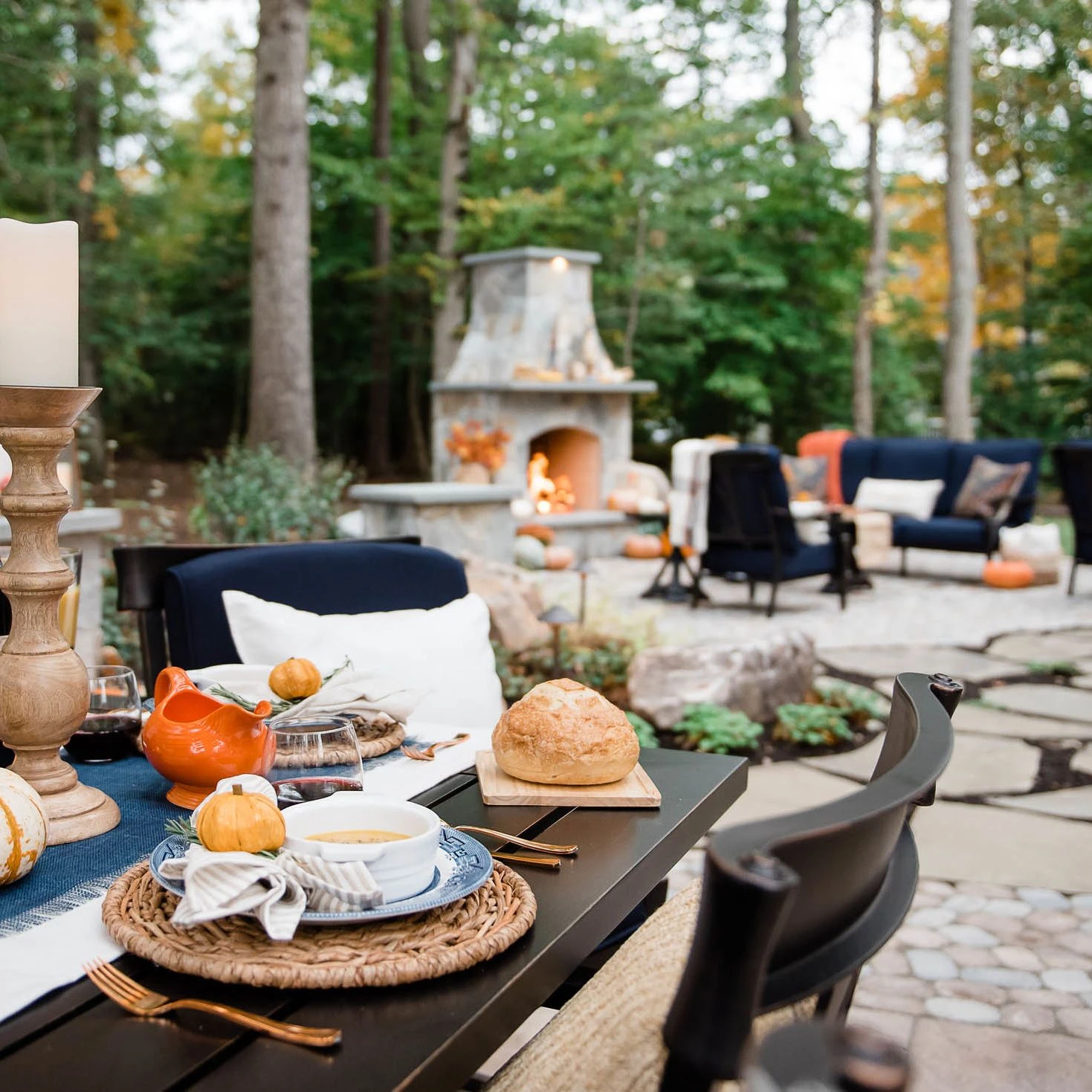 Decorated dinner table on backyard patio ready for a meal
