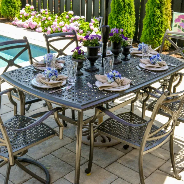 Backyard pool area with paver patio and furnished outdoor table