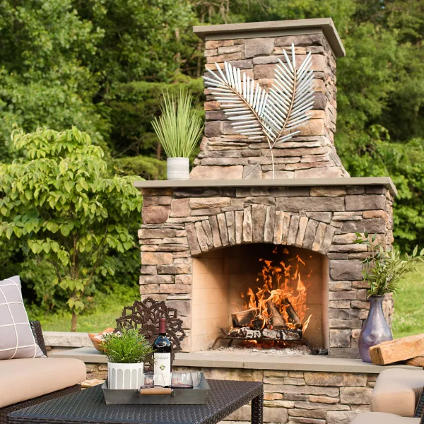 outdoor fireplace on a paver patio