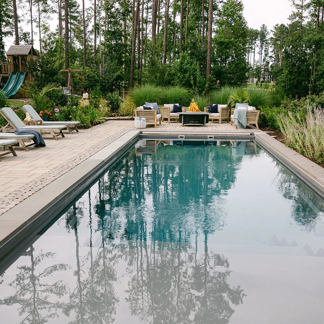 Imagine Pools fiberglass pool trimmed with bluestone treads