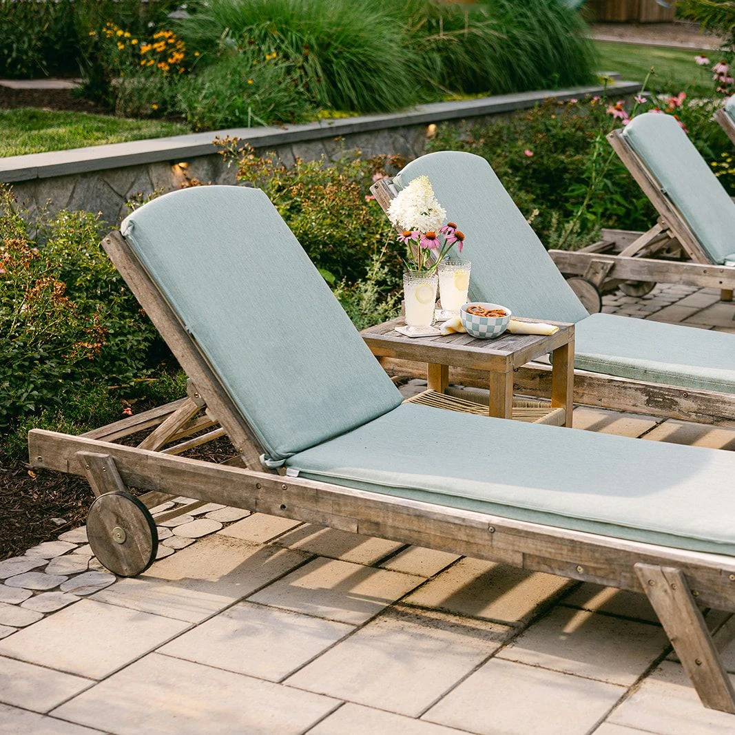 Modern pool chairs on Champlain Grey pavers