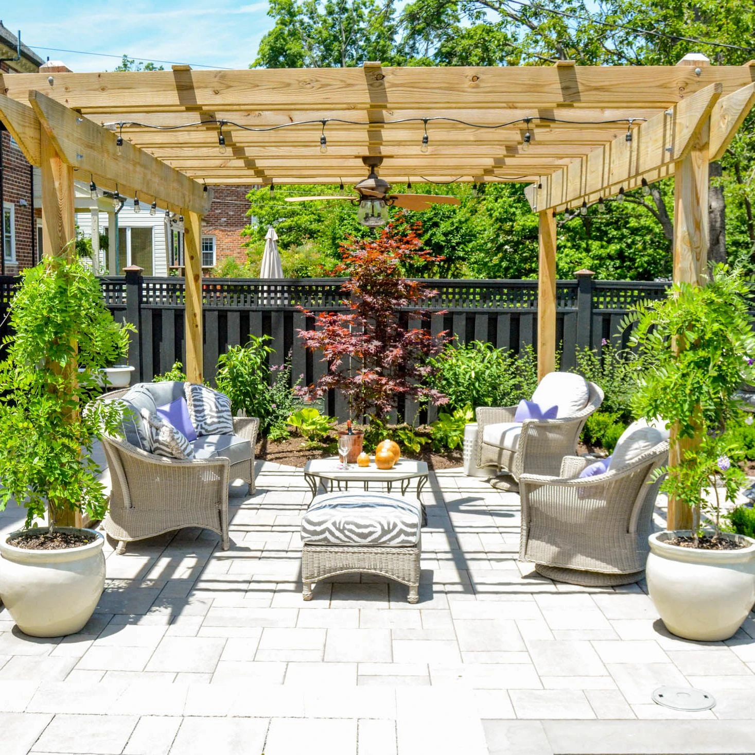Beautiful backyard pergola over seating area