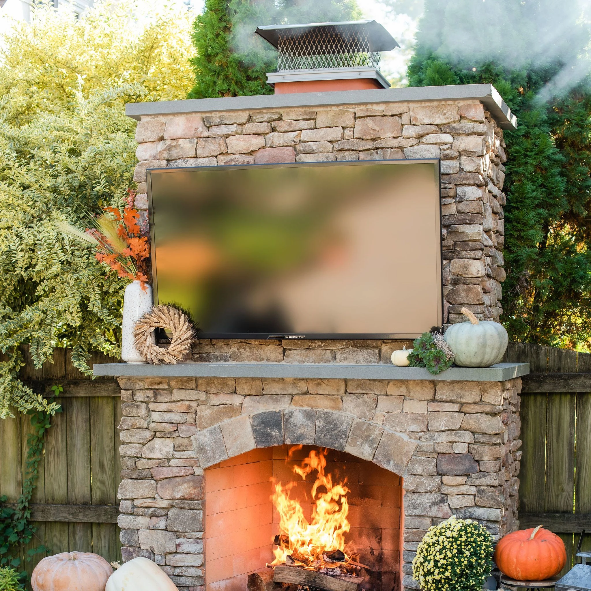 Custom stone fireplace with Outdoor TV