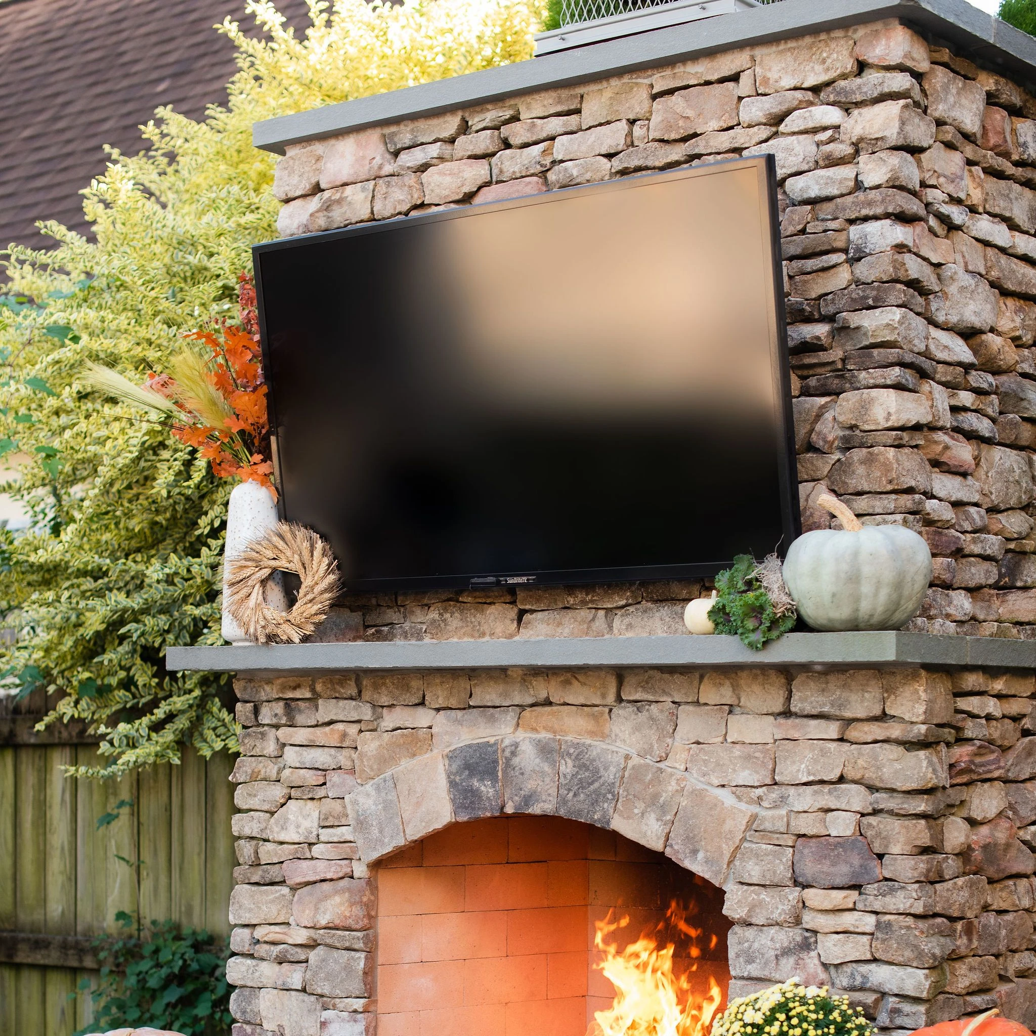 TV installed in backyard for seamless entertaining