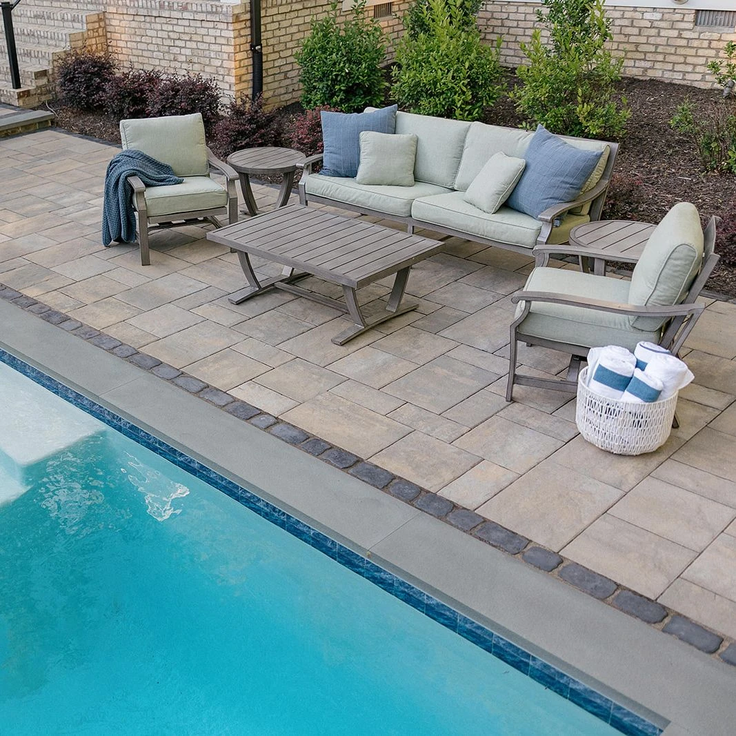 Custom backyard poolscape combining comfort, style, and functionality