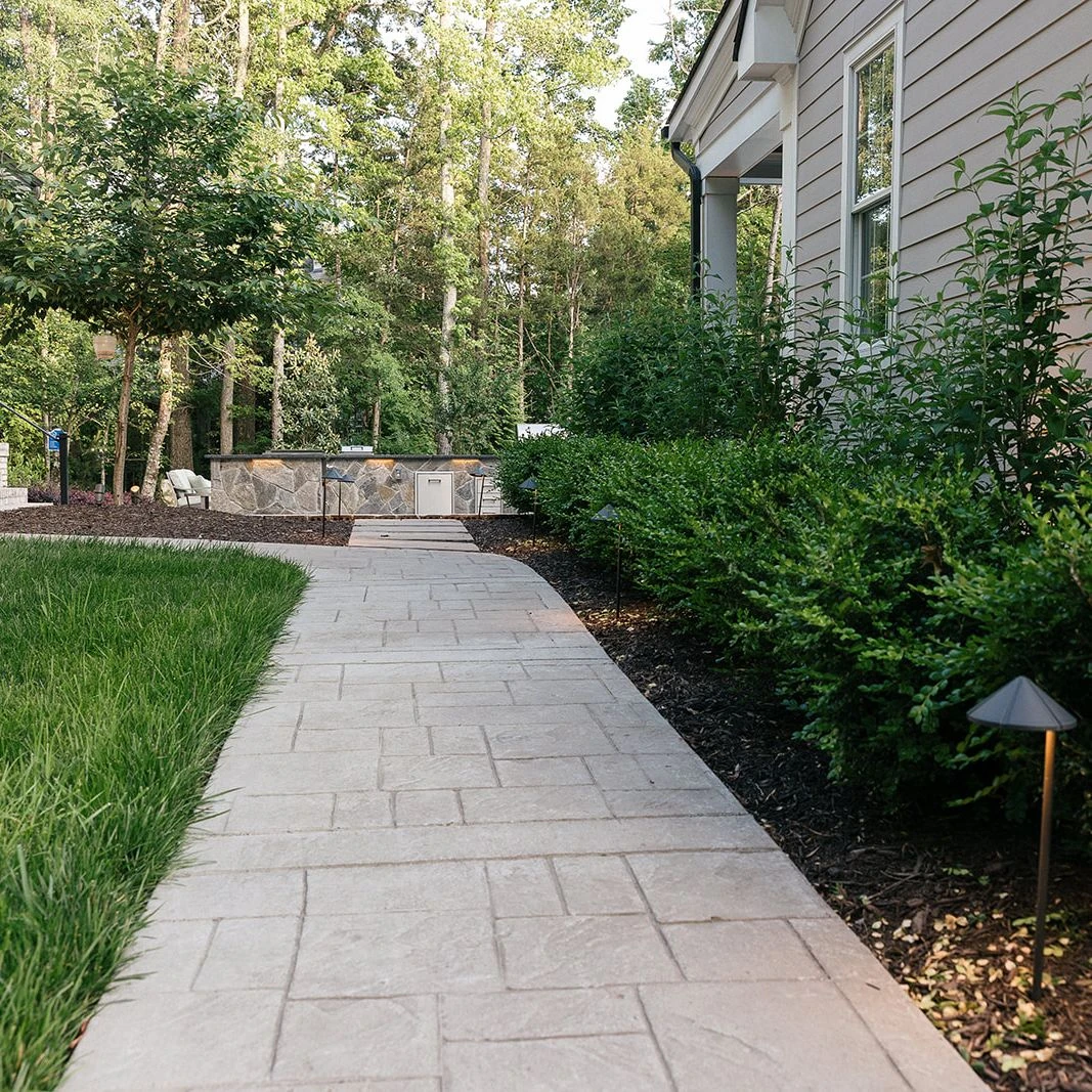 Tiered hardscape with Chocolate Grey thin stone veneer
