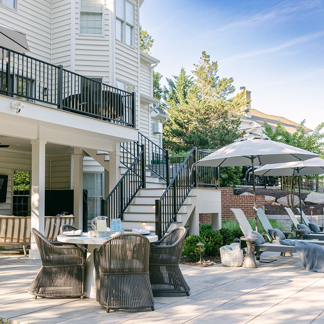 fiberglass swimming pool with paver pool deck and composite deck