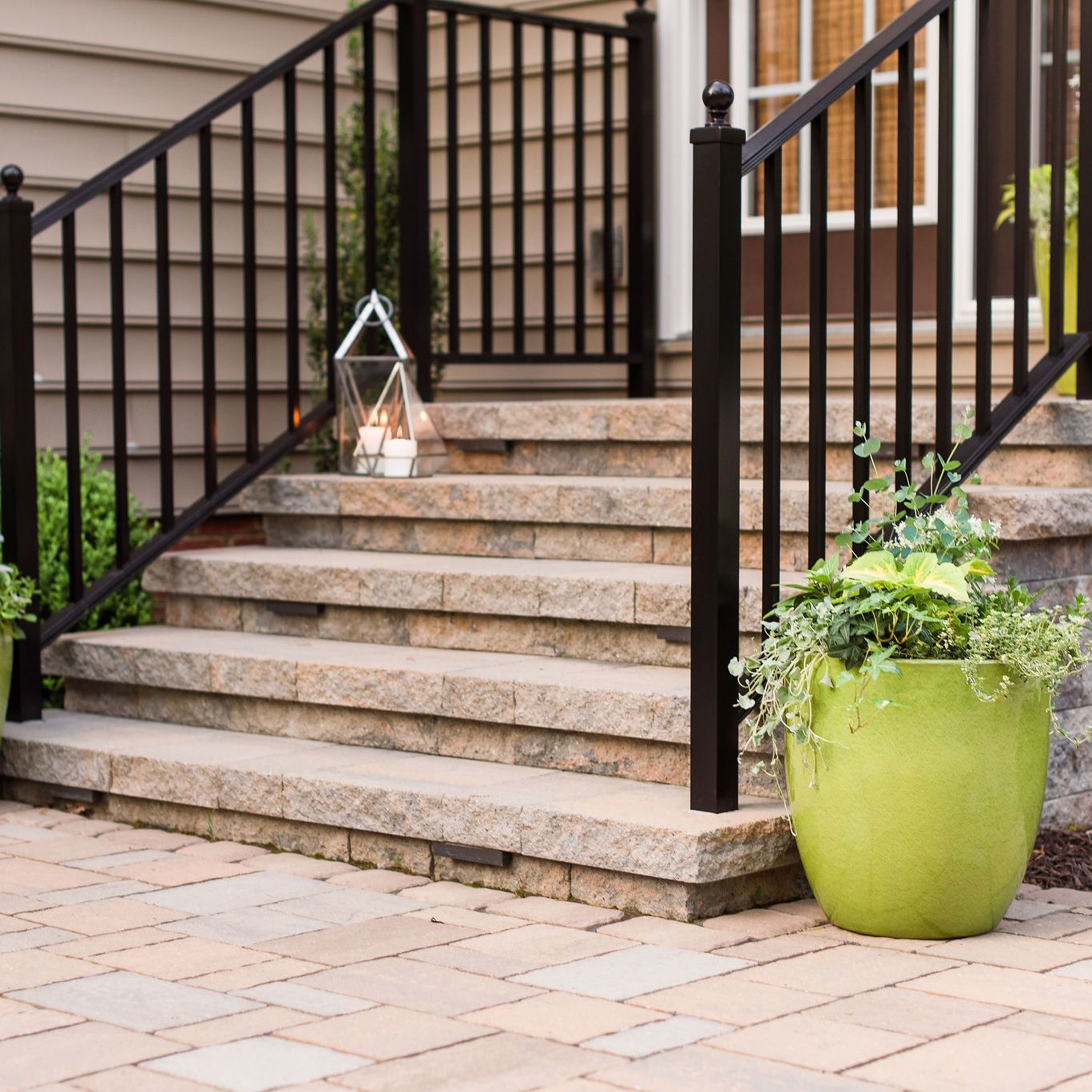 Patio stairs coming out from the backdoor.
