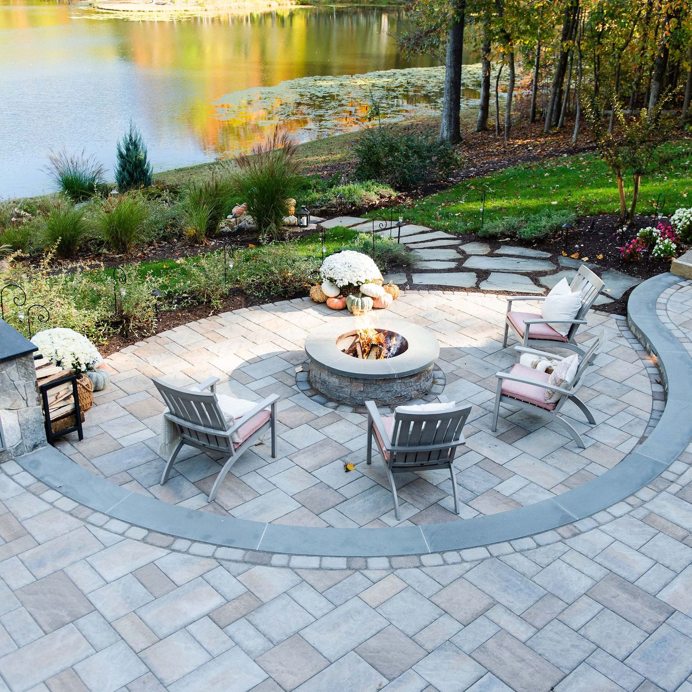 Lake-view outdoor living space with fire pit