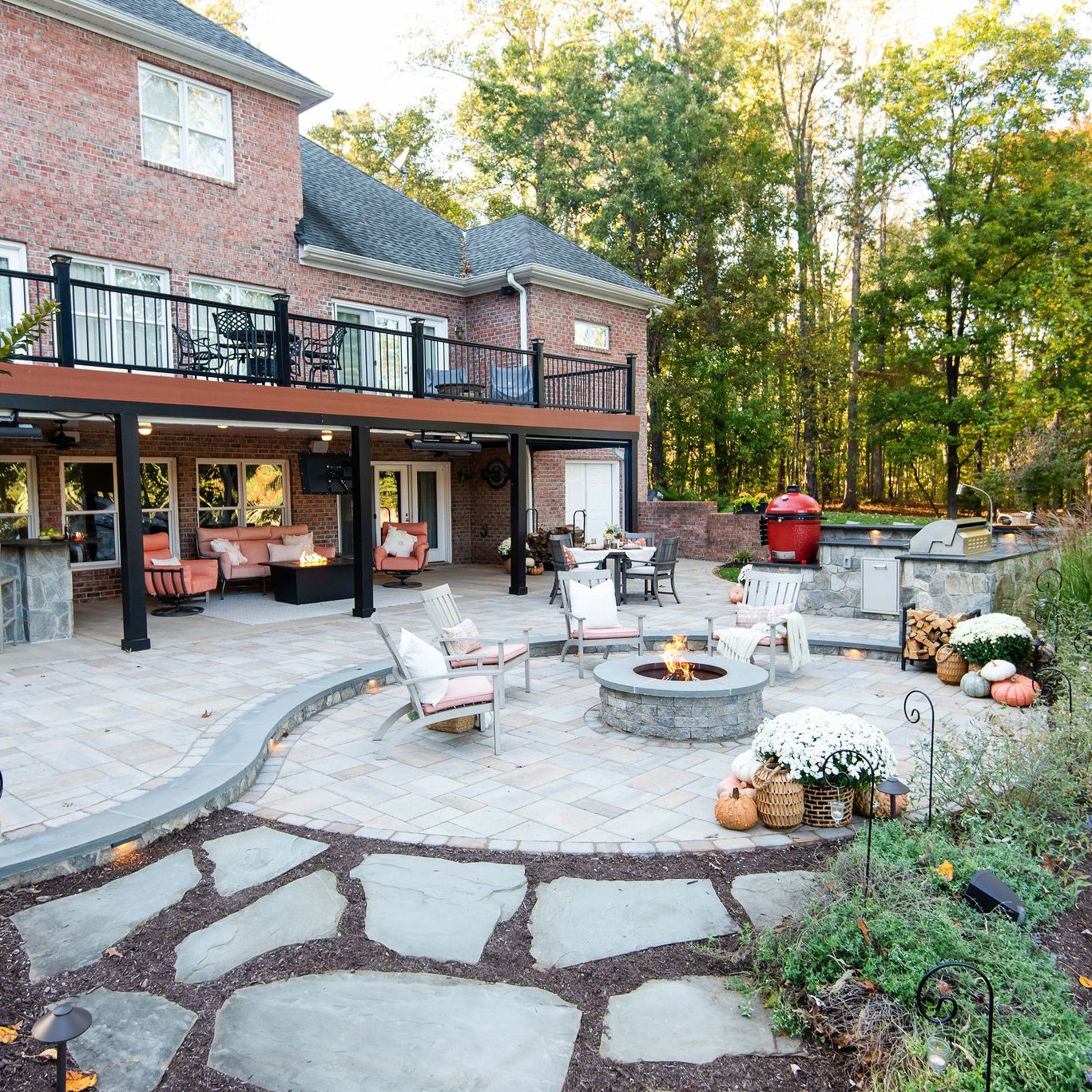 Multi-functional patio with fire pit and built-in outdoor appliances
