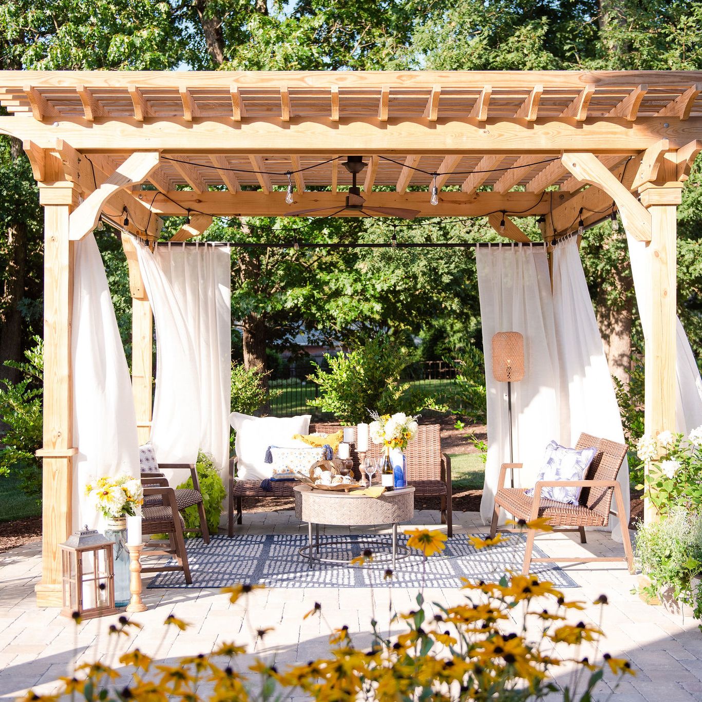 Pergola with fan and curtains