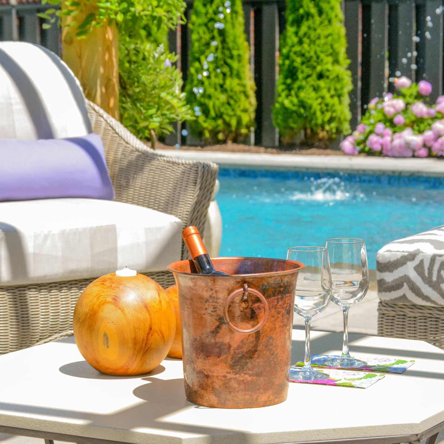 outdoor backyard entertainment area by the pool