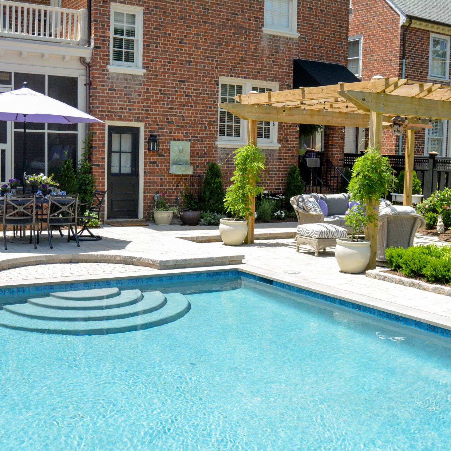 backyard pool and pergola