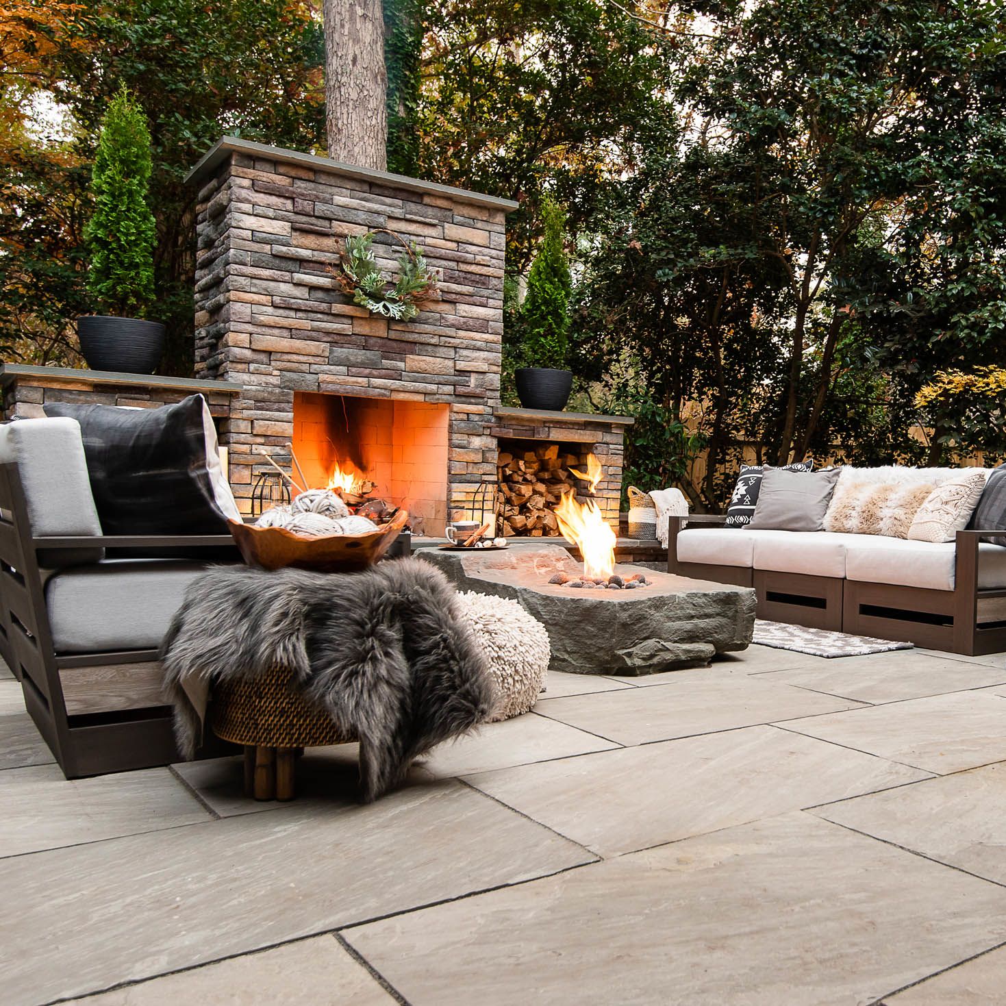 gorgeous fire place centerpiece in backyard patio installation
