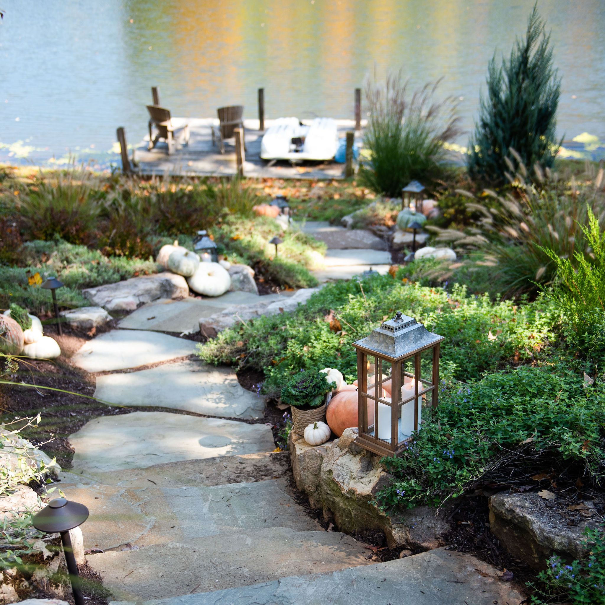 Bluestone and fieldstone stairway connecting patio to lake