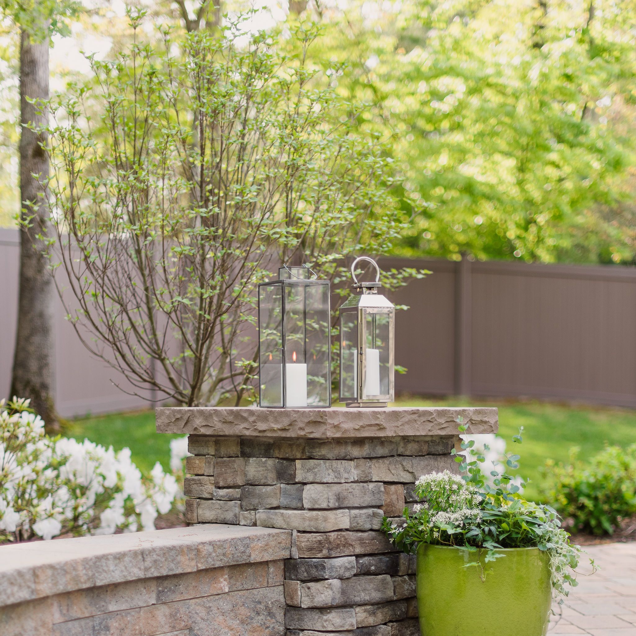 Eldorado stone pillar on a Techo-Bloc paver patio.