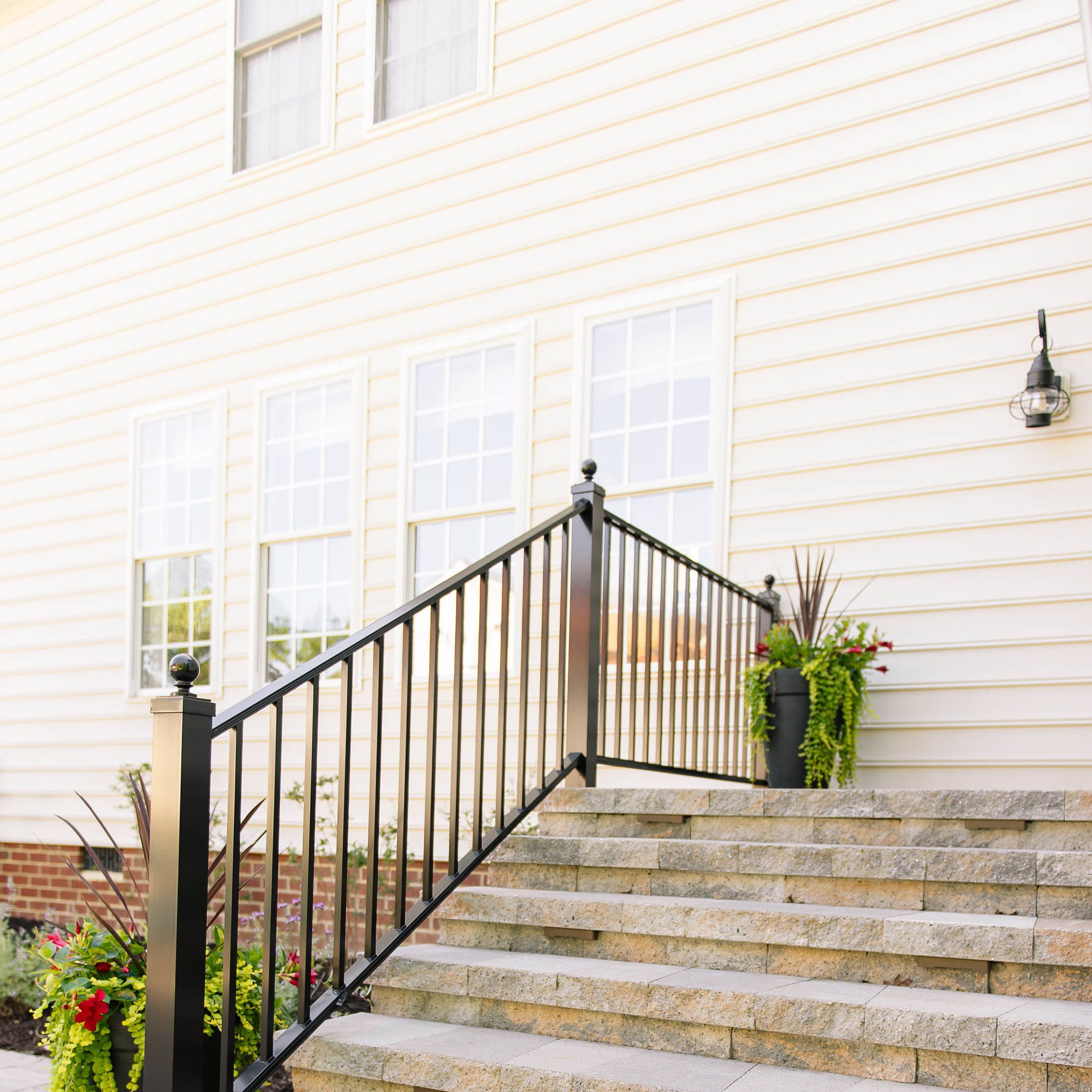 Stone stairway leading to the backyard patio