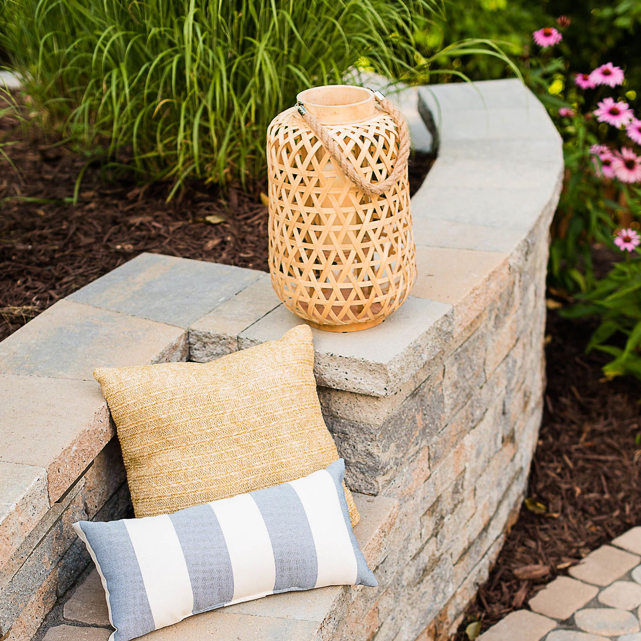 natural stone retaining wall functioning as a beautiful sitting wall