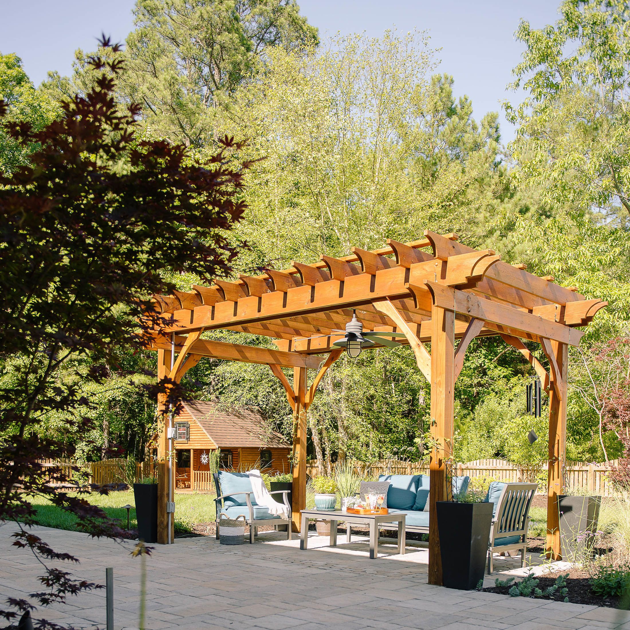 Large pergola over backyard patio sitting area