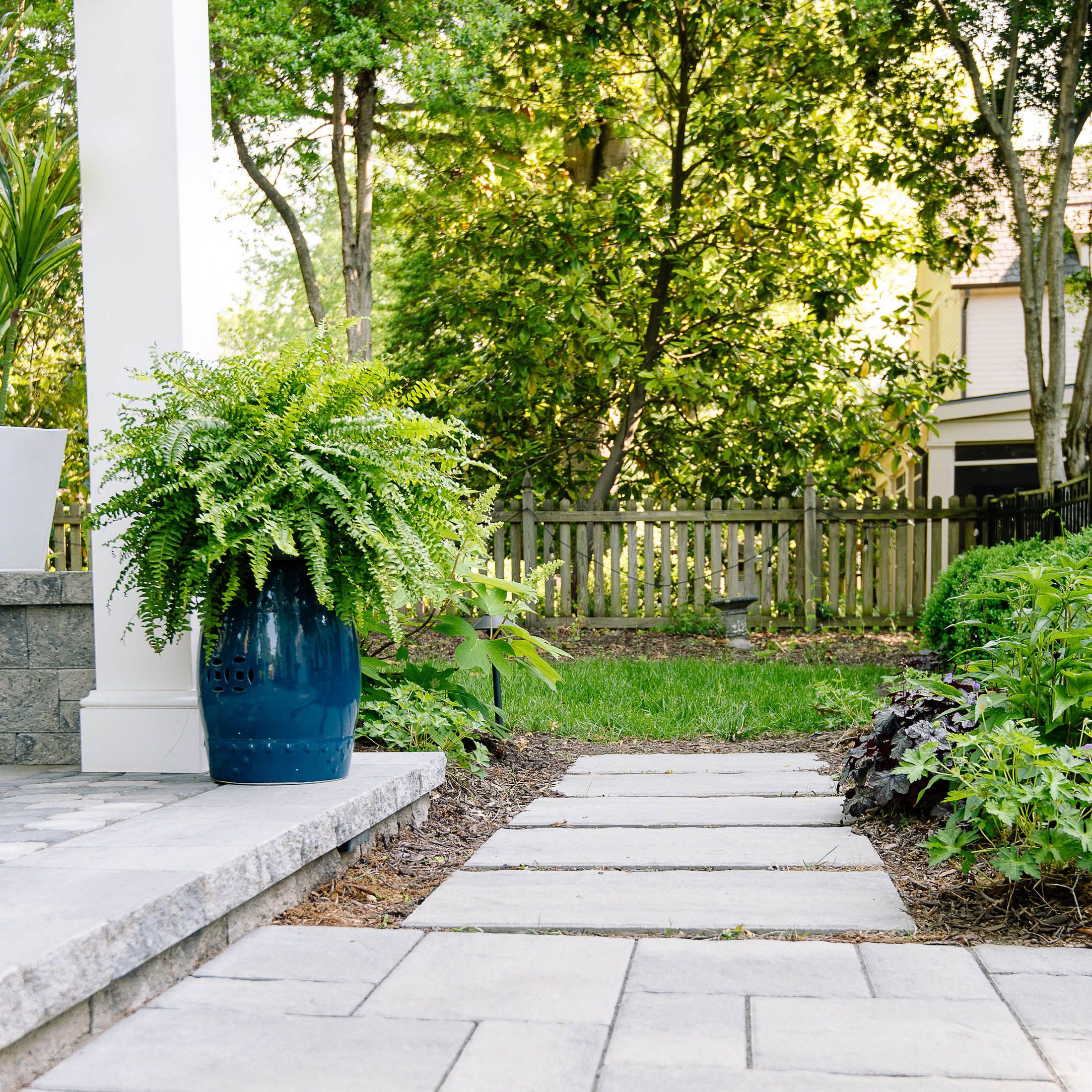 light grey stepping stone walkway into patio