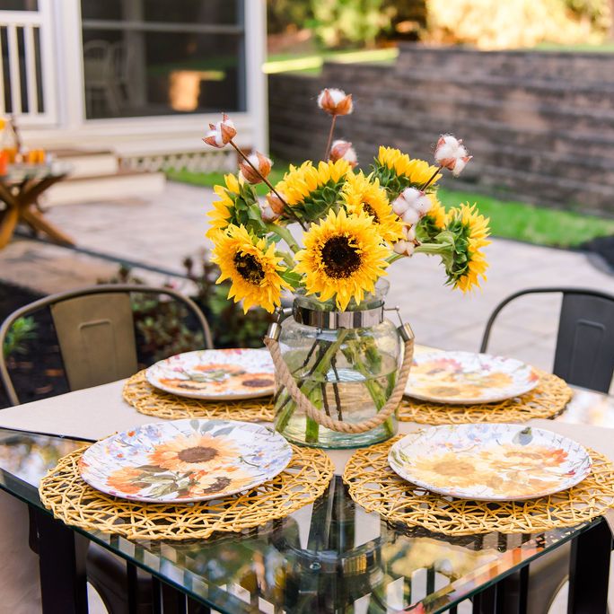 Sunflowers on a backyard patio table